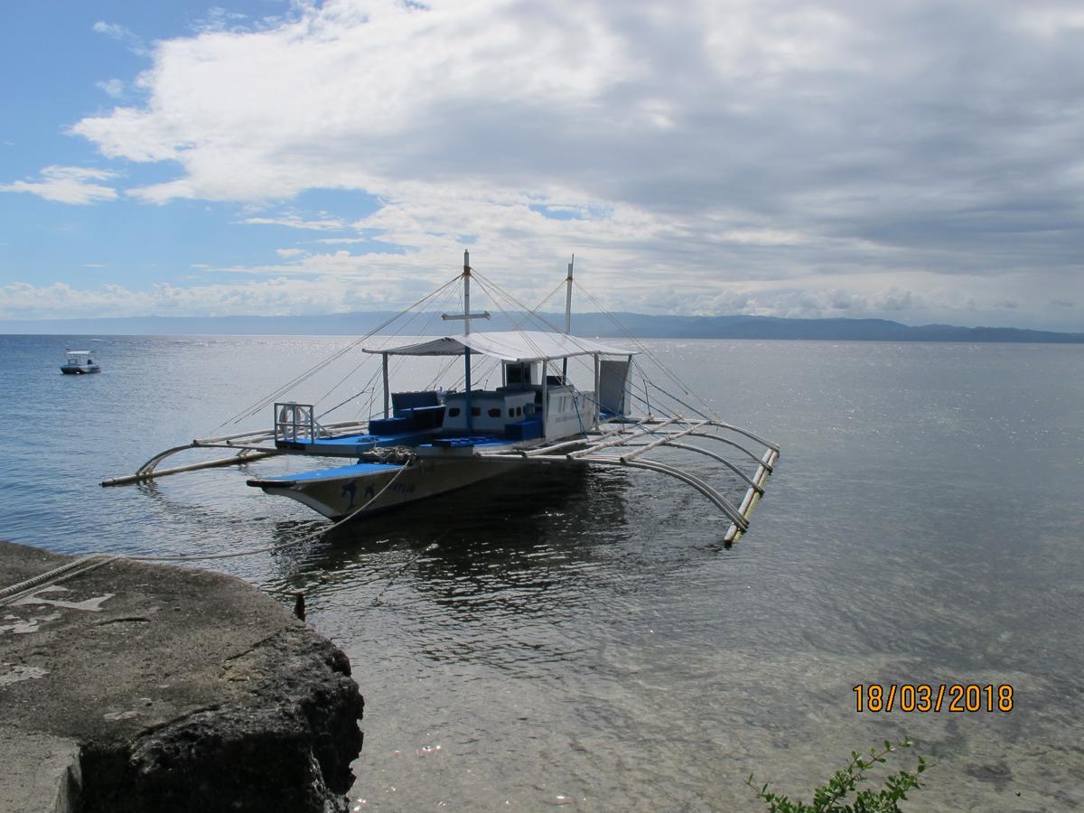Cabilao Sunset Dive & Beach Resort Loon Kültér fotó